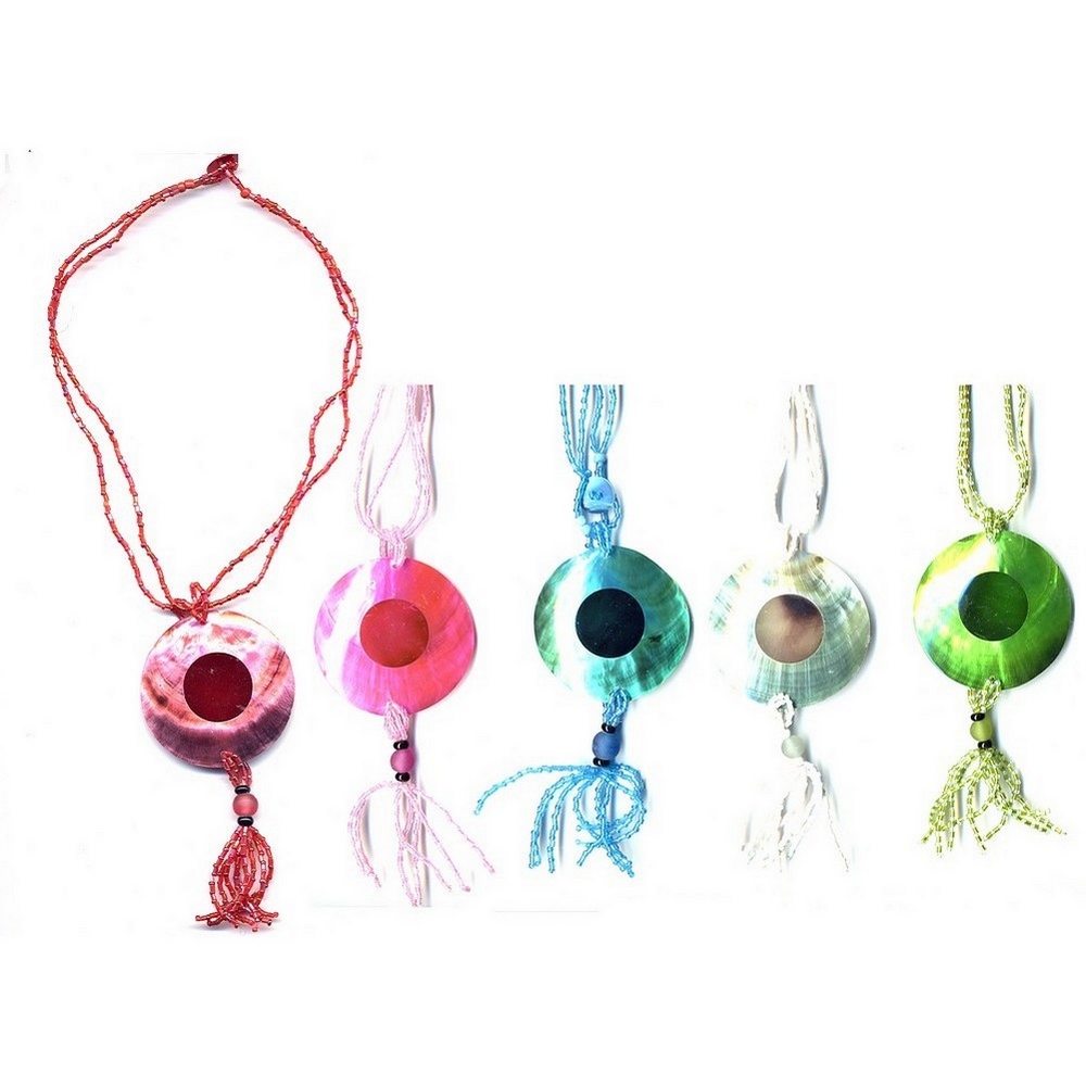 Necklace with a pendant shell disc with dark dot